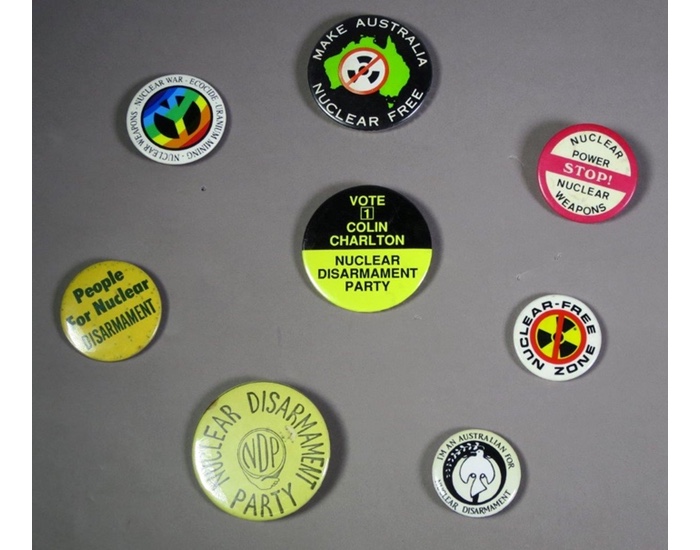 A group of badges for disarmament